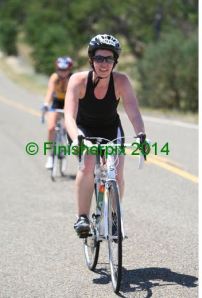 I'm a little tired of tri training. Here on Wildflower's bike leg, I had yet to learn of my sunburn. 